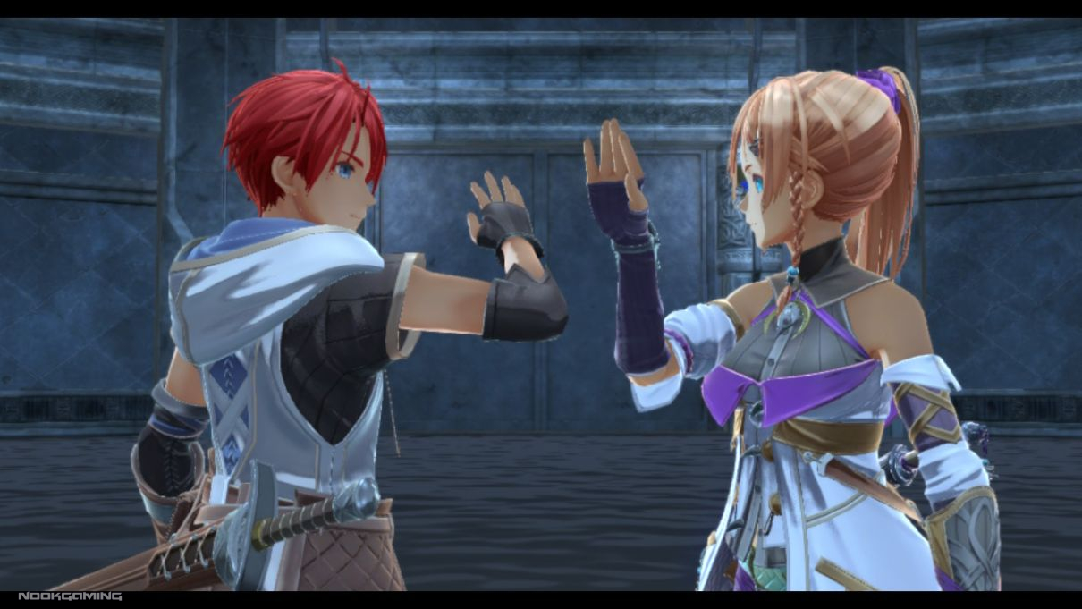Adol and Karja high fiving