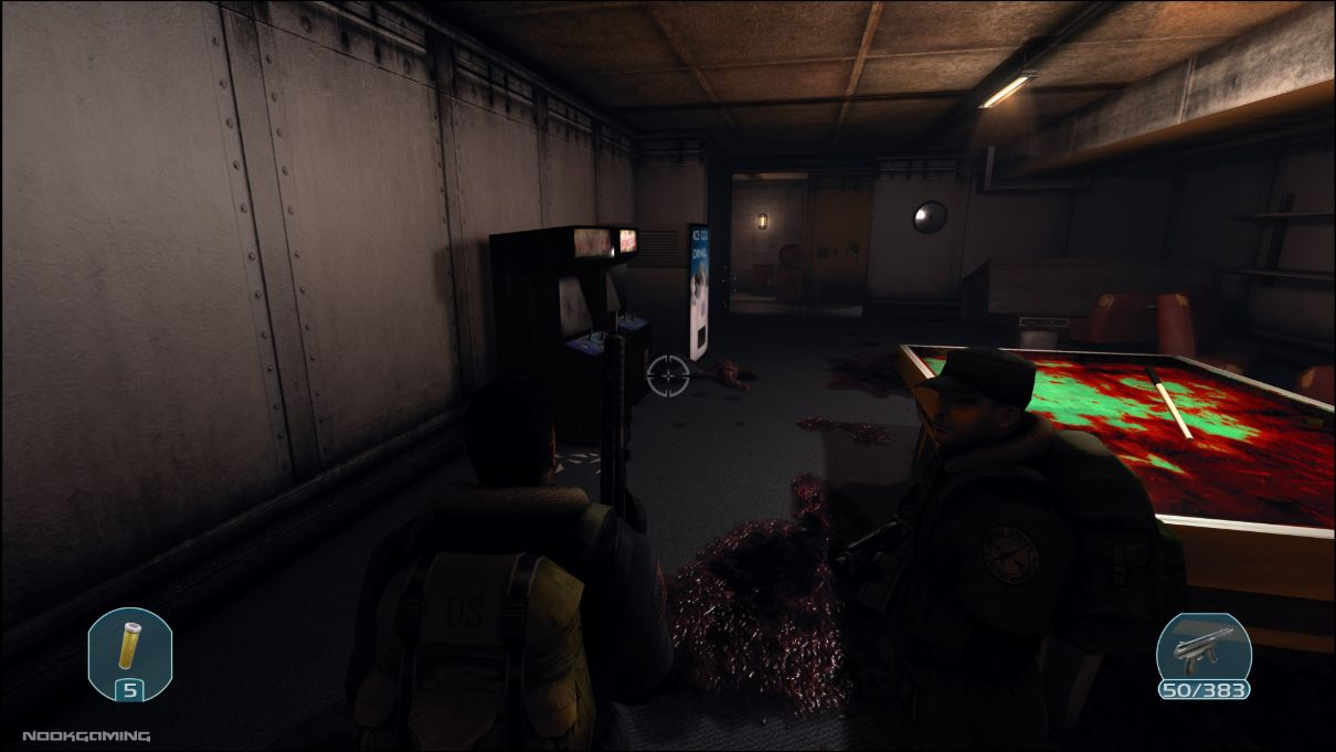 Going through a bloodied recreation room in The Thing: Remastered