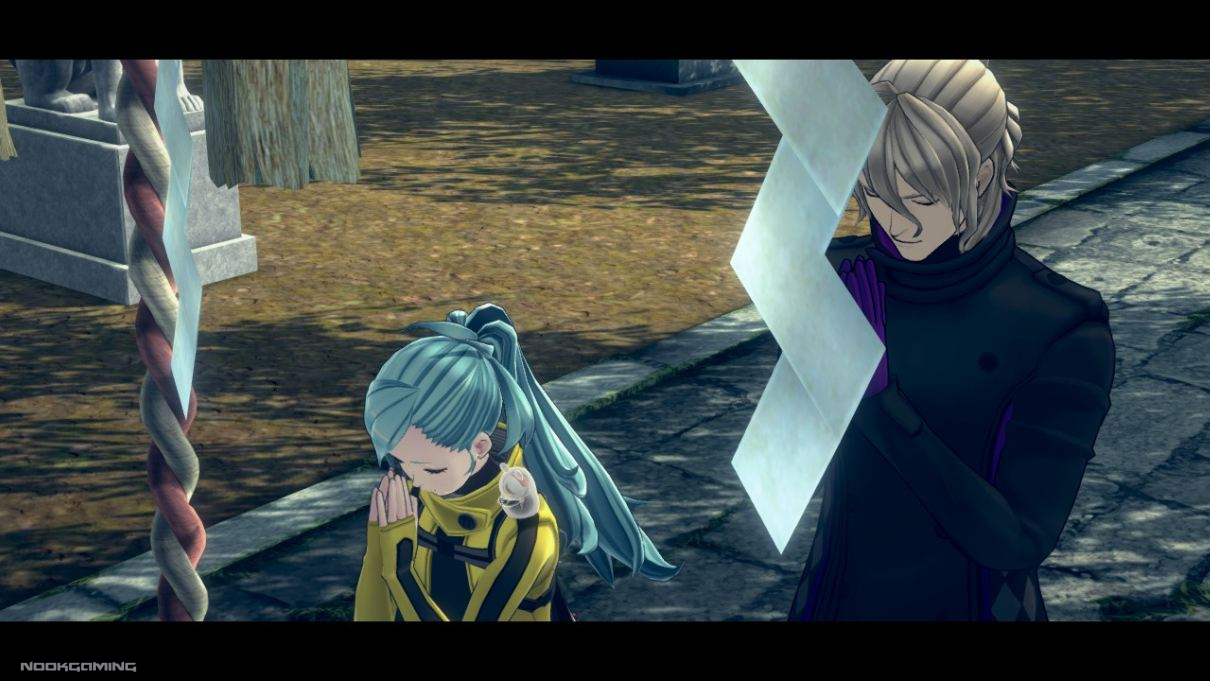 Date and Mizuki praying at a shrine