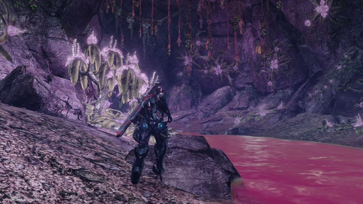 A purple-tinted cave with plantlife