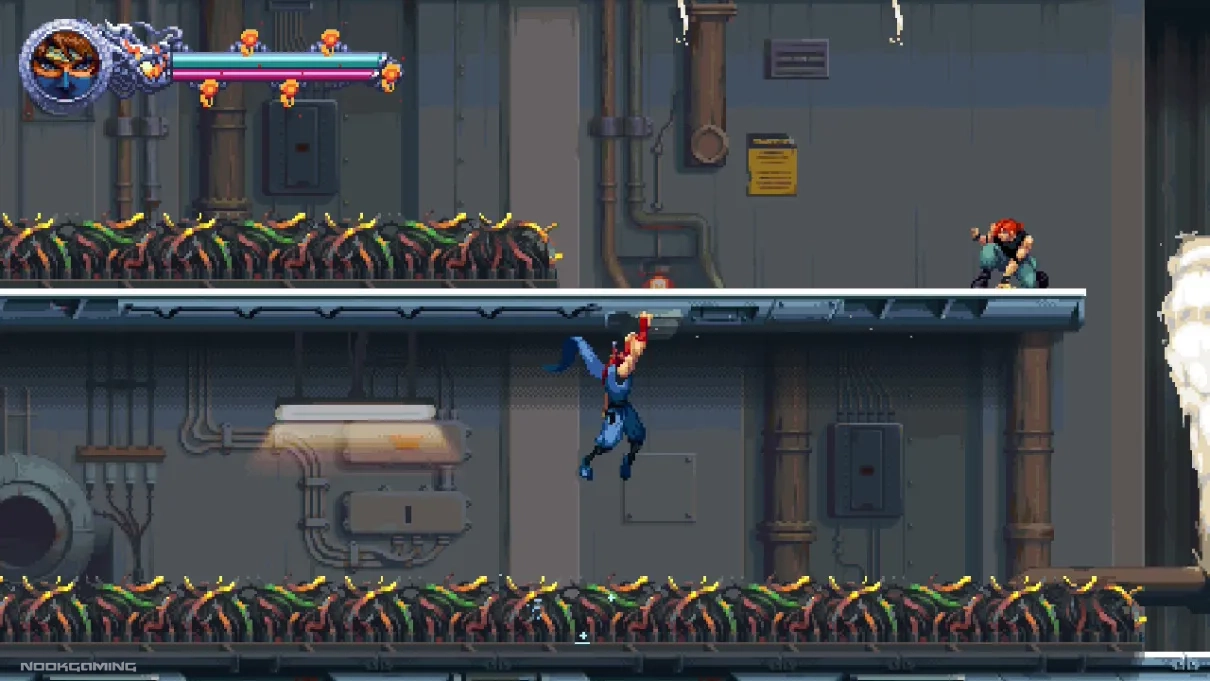 Kenji navigating a hazard by clinging to a ceiling